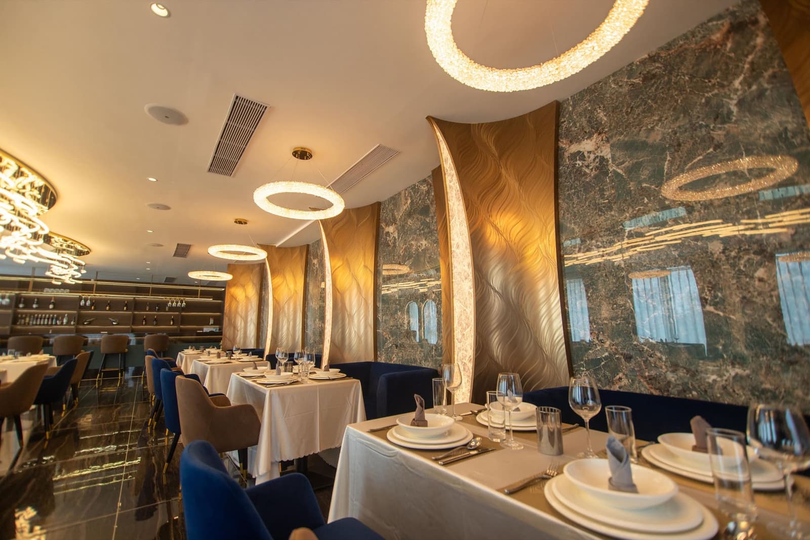 ESP Hotel lounge with garden views and green velvet seating